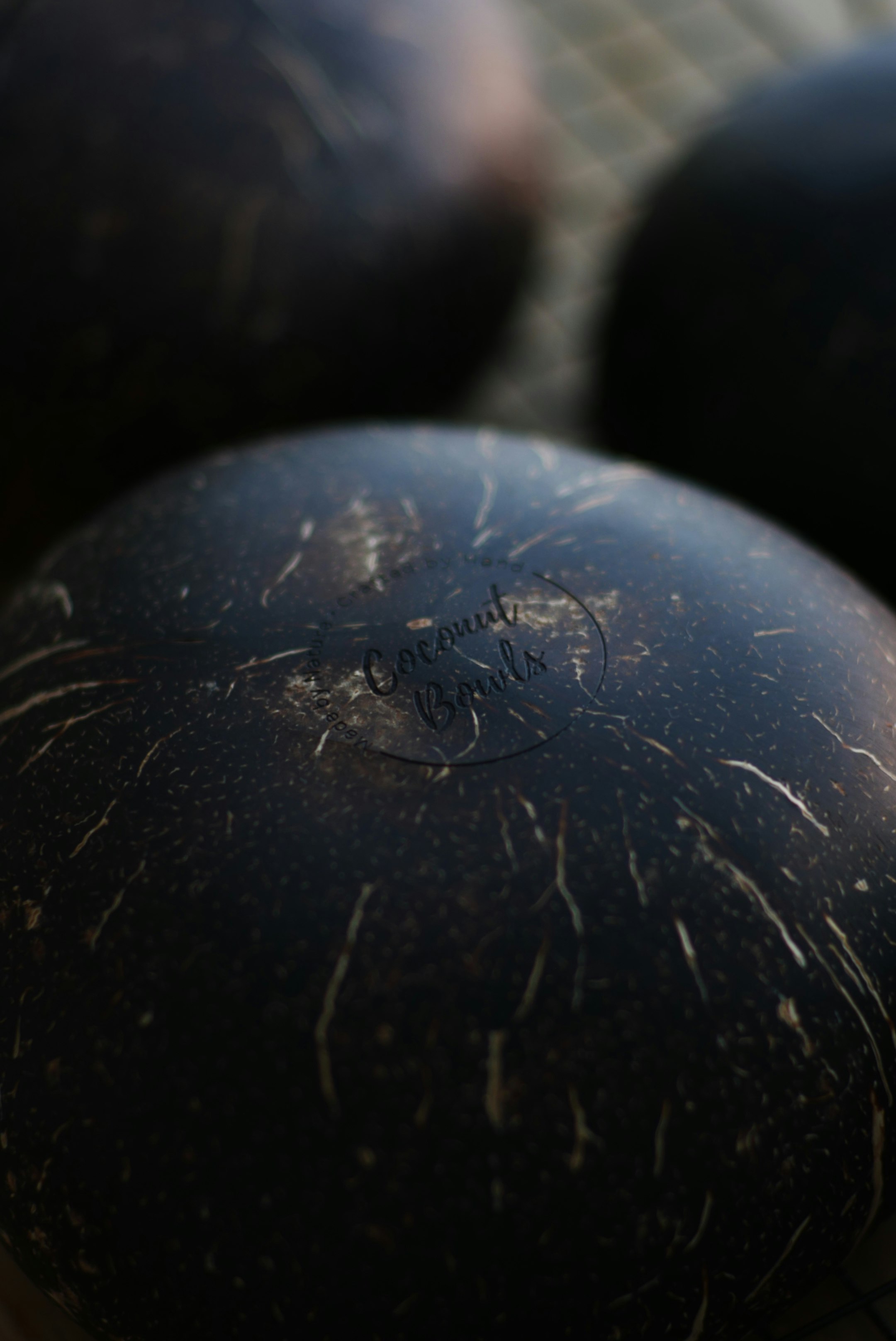 black round ball with black background